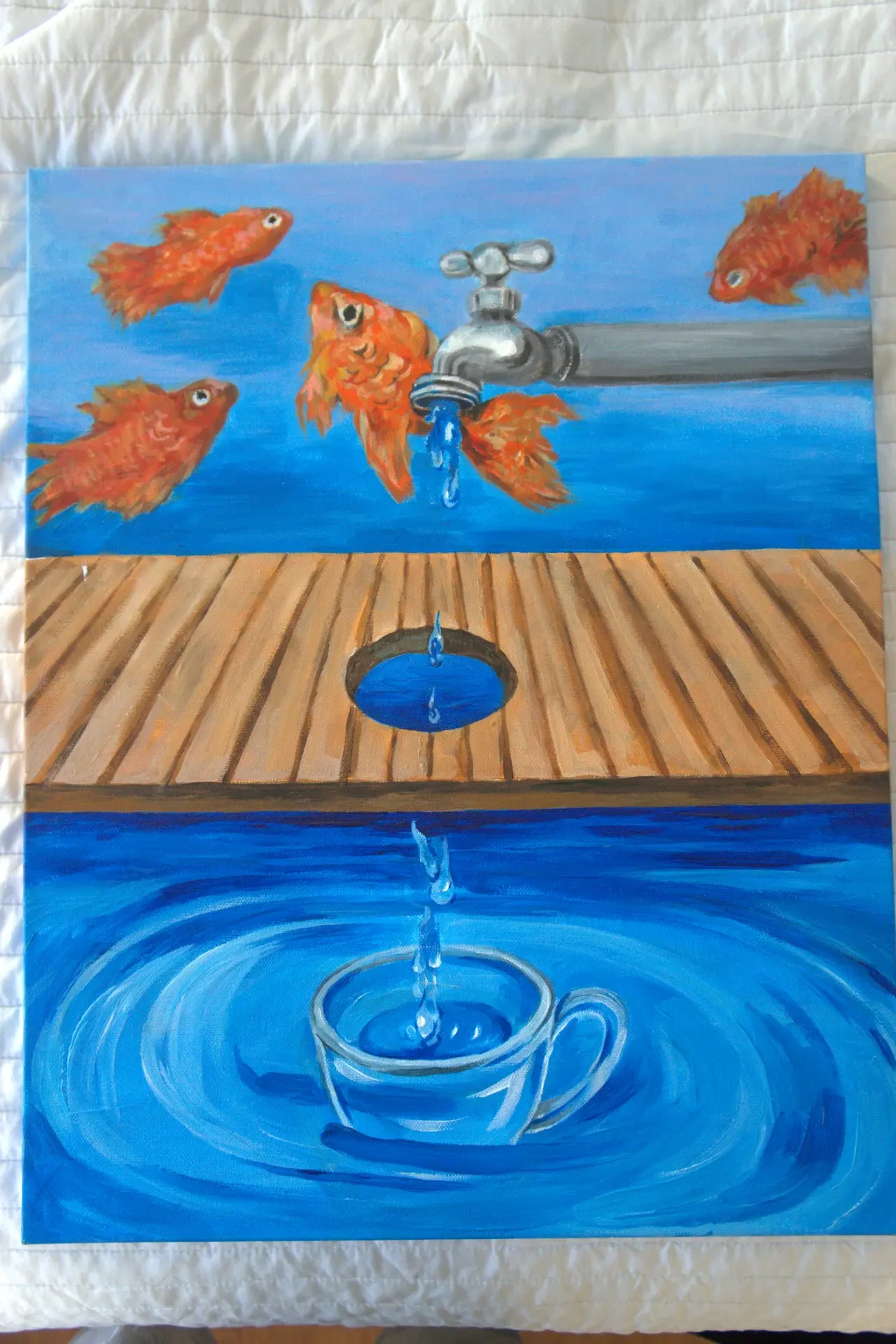 Three painted panels stacked vertically: goldfish circling a faucet above, a wooden drain in the middle, and a teacup in swirling blue water below